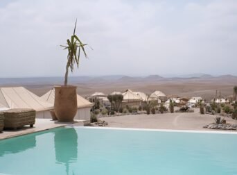 Luxury desert camp in Agafay with stunning views and a tranquil poolside retreat.