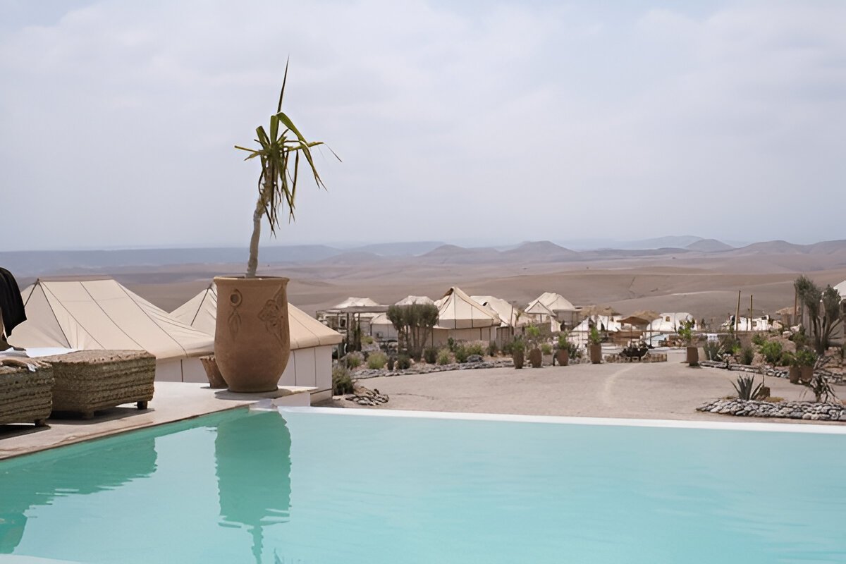 Luxury desert camp in Agafay with stunning views and a tranquil poolside retreat.